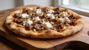 Spiced lamb flatbread pizza with feta and pine nuts