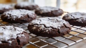 Crinkly fudgy devil's food cake cookies on a cooling rack
